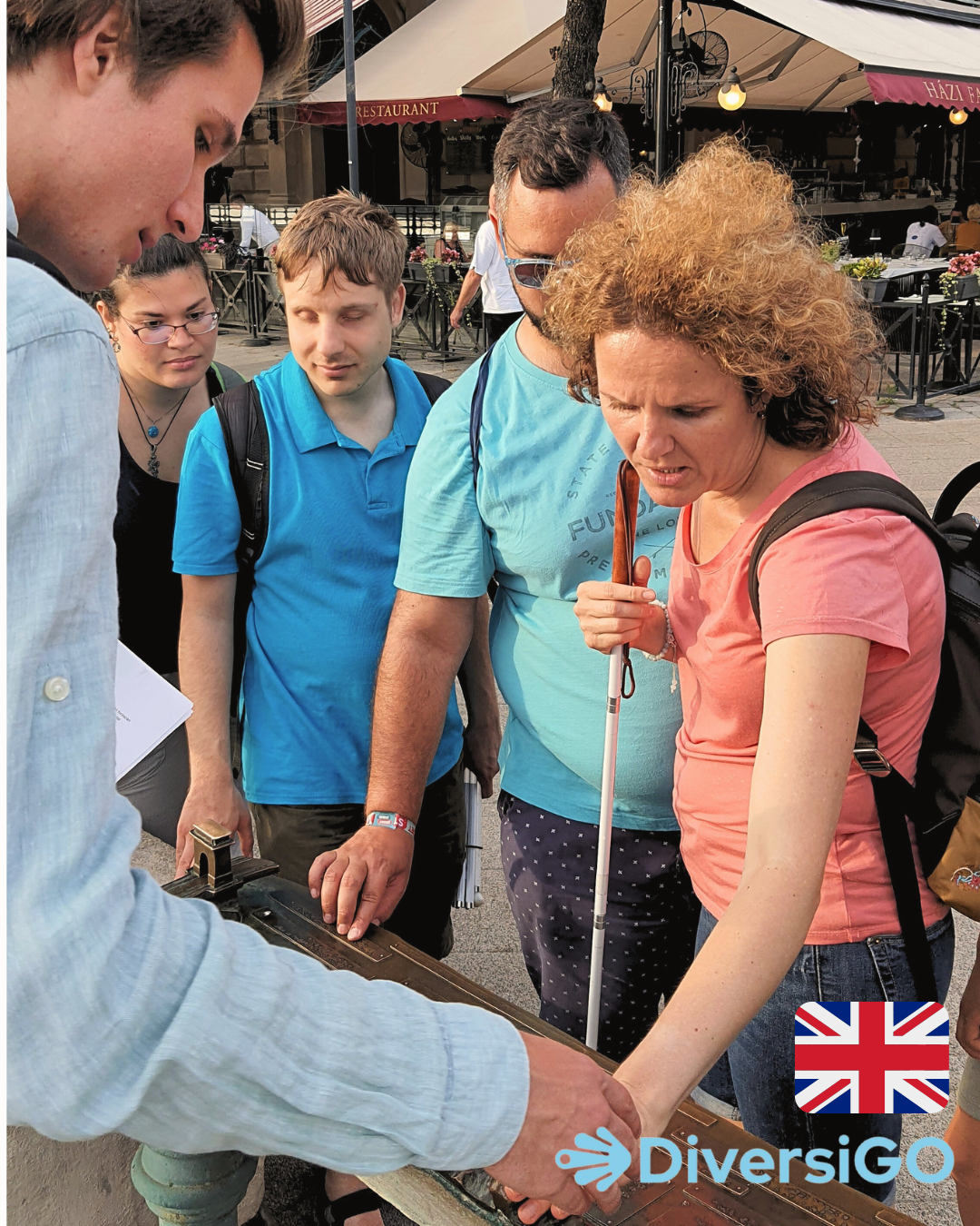 DiversiGO's guide is showing the UNESCO world heritage panorama and sights on a tactile model at the Danube Promenade.